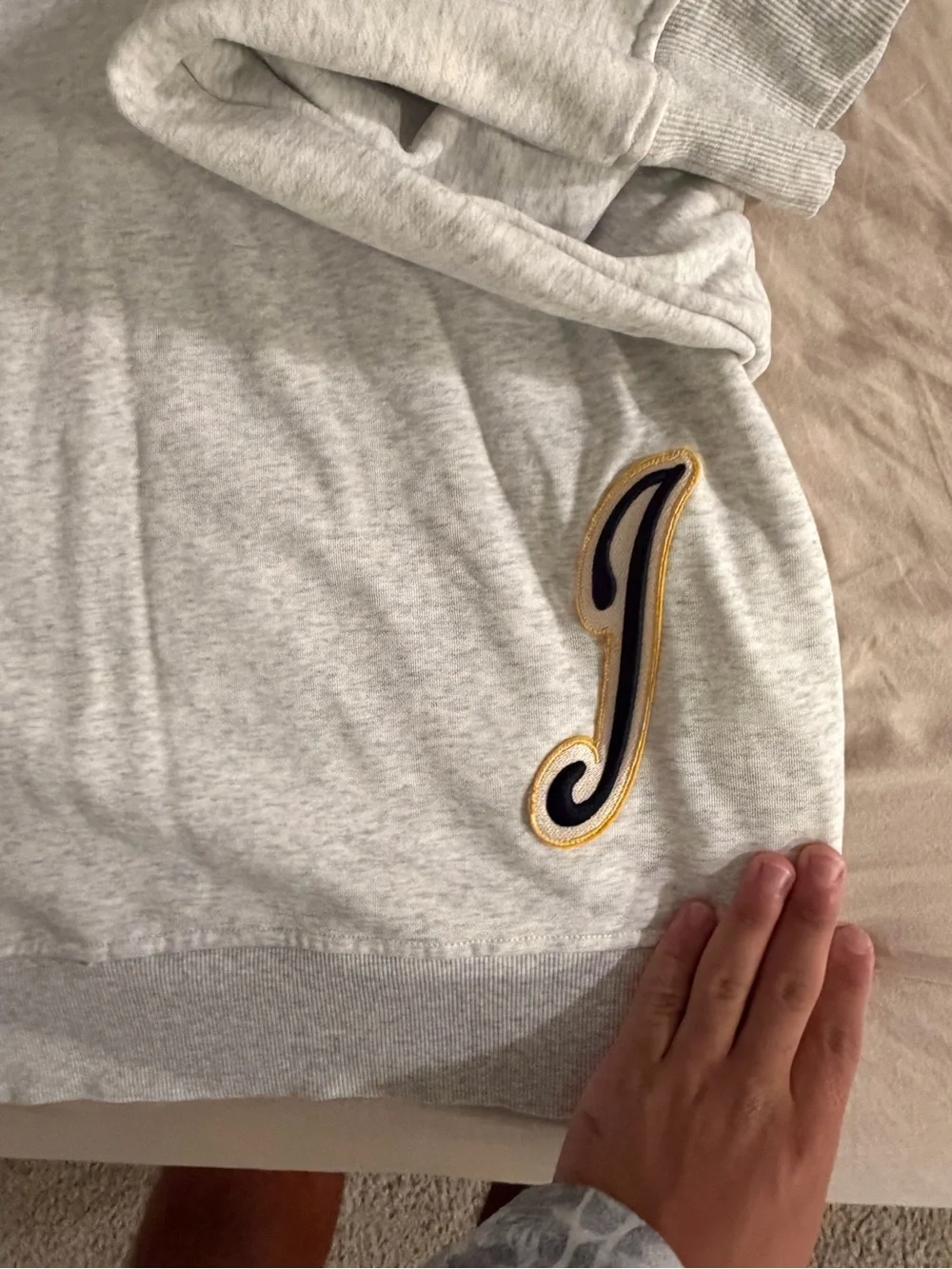 Jacquemus Light Gray Hoodie with Black and Yellow Logo
